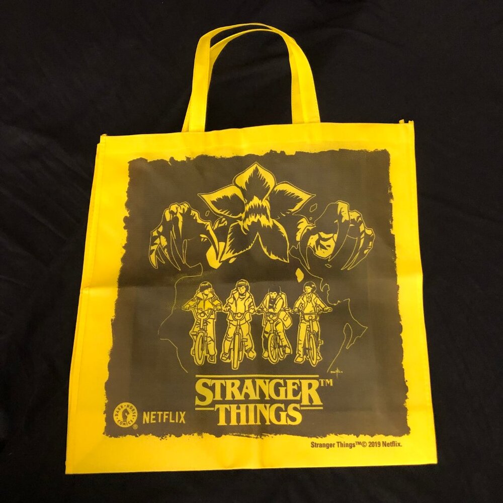 STRANGER THINGS Collectible Tote Bag! Toss your things in the Upside Down.